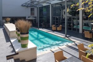 Outdoor swimming pool at City Lodge Hotel O.R. Tambo Airport, providing a relaxing space for guests between flights or before onward travel.