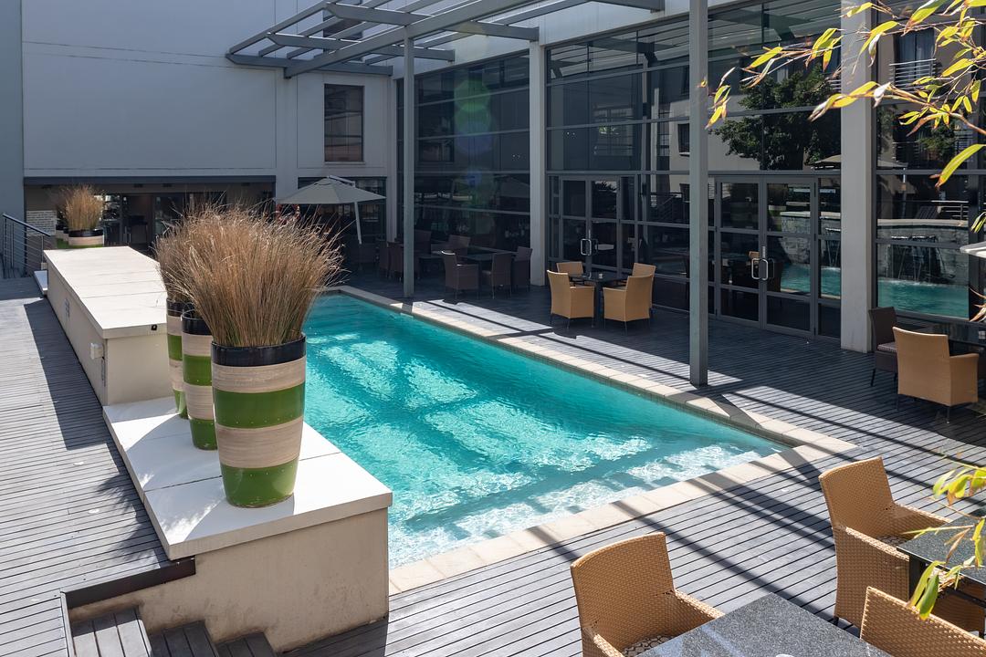 Outdoor swimming pool at City Lodge Hotel O.R. Tambo Airport, providing a relaxing space for guests between flights or before onward travel.
