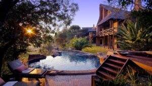 Main building and pool at Lukimbi Safari Lodge